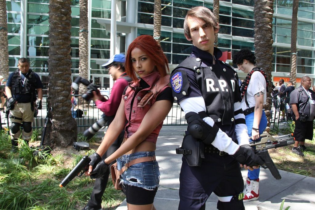 Cosplayers dressed as Claire Redfield and Leon S. Kennedy from Resident Evil 2 at WonderCon 2015