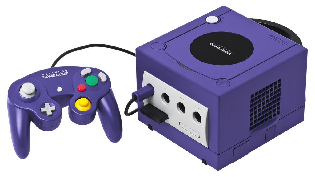 Purple Nintendo GameCube console with controller and memory card